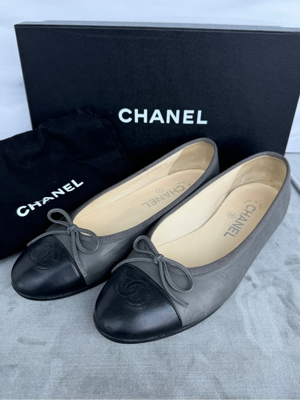 Chanel Gray and Black Leather Cap-Toe Ballet Flats with Bow - Aged Calfskin